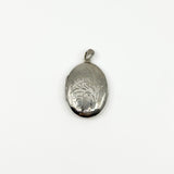 Vintage sterling silver oval photo locket with foliate engraving and polished bail