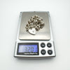 Vintage sterling silver bracelet weighing 32.01 grams on digital scale