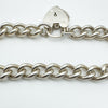 Silver bracelet with solid curb links and visible hallmarks