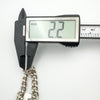 Measuring silver curb link thickness with digital calipers