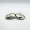 Open domed silver locket side angle
