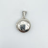 Vintage sterling silver round puffy locket with foliate engraving