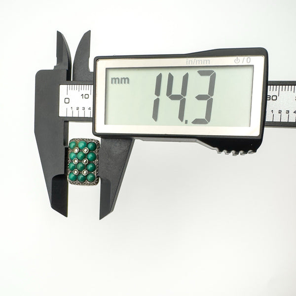 Measuring the ring’s width at 14.3mm