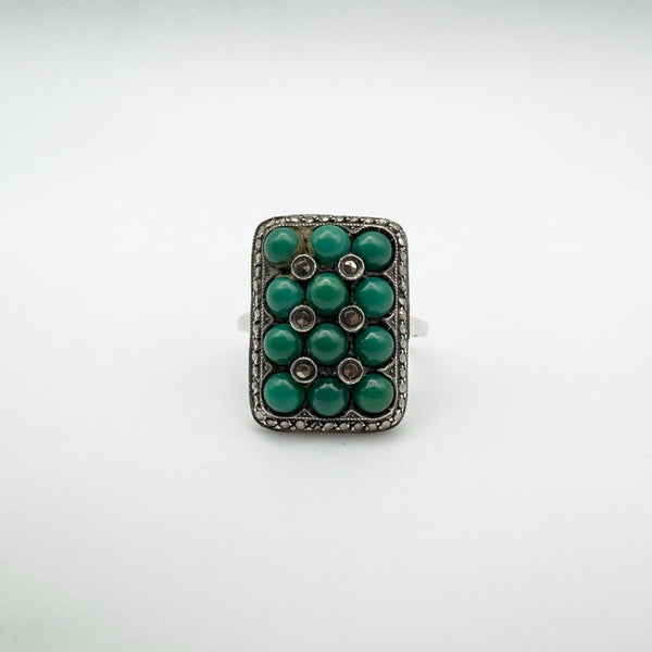 Front view of green turquoise cabochon ring