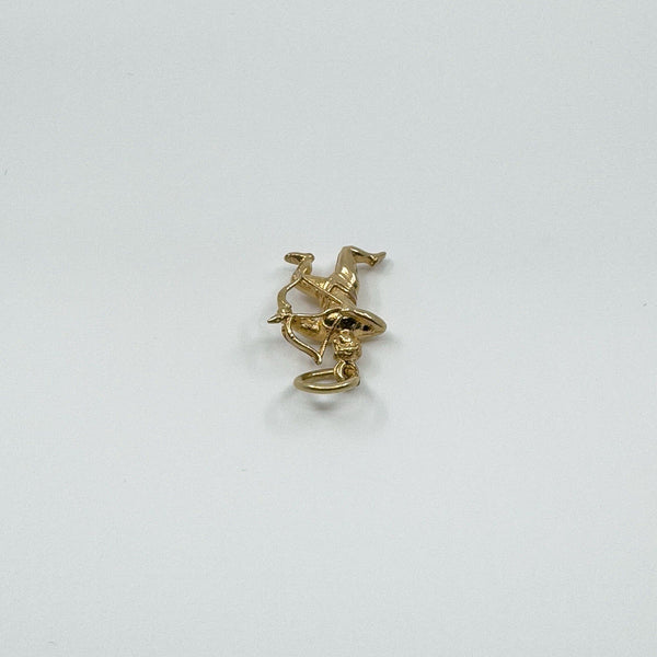 Angled view of 9ct gold Sagittarius pendant with visible bow and archer pose