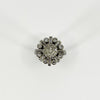 Front view of vintage platinum 2.70ct diamond cluster ring with old cut centre and alternating diamond surround.