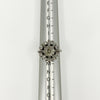 Vintage platinum 2.70ct diamond cluster ring shown front-on on a ring mandrel at UK Size K.