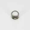 Rear view of vintage platinum diamond cluster ring showing the gallery, band and raised cluster setting.