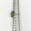 Vintage platinum diamond cluster ring shown side-on on a ring mandrel at UK Size K.