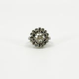 Vintage platinum diamond cluster ring with 1.50ct estimated old cut centre and geometric diamond surround.