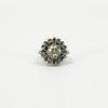 Vintage platinum diamond cluster ring with 1.50ct estimated old cut centre and geometric diamond surround.