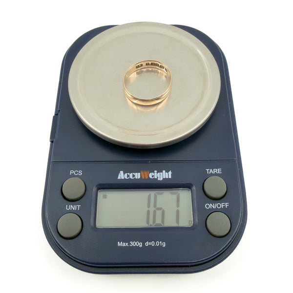 Victorian 9ct rose gold band ring on digital scales showing approx. 1.67g.