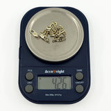 Digital scale showing the weight of a vintage 9ct white gold mariner link bracelet