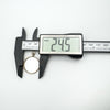 Gold photo locket measured at 24.5mm width using digital calipers