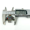 Calipers showing approx. 34.93mm width of the sterling silver giardinetti floral basket brooch.