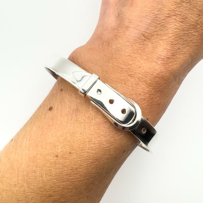 Preloved sterling silver buckle bangle bracelet on wrist