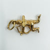 Side view of vintage 9ct gold Sagittarius charm showing full hallmarks
