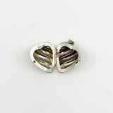 Inside view of the vintage sterling silver puffy heart photo locket with 925 stamp.